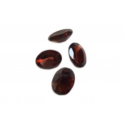 garnet faceted oval 7x9mm
